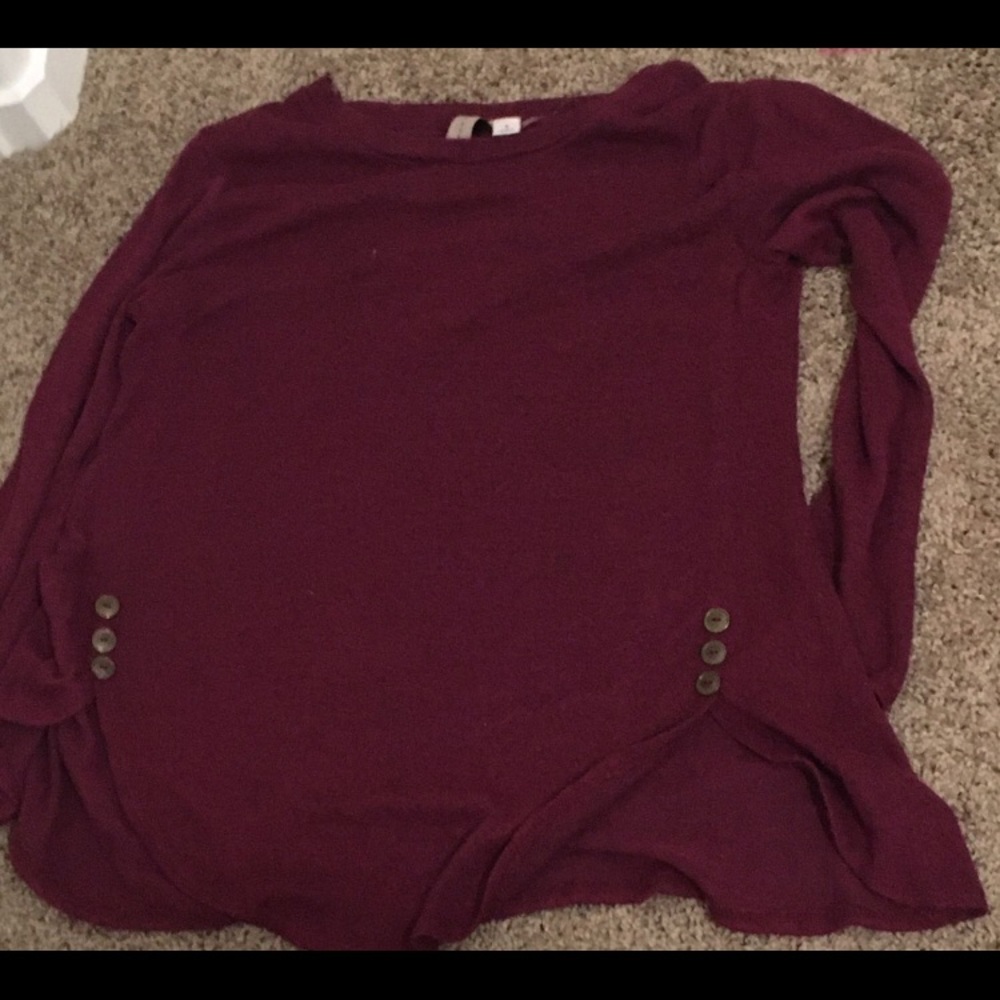 Burgundy long sleeve with buttons down the sides